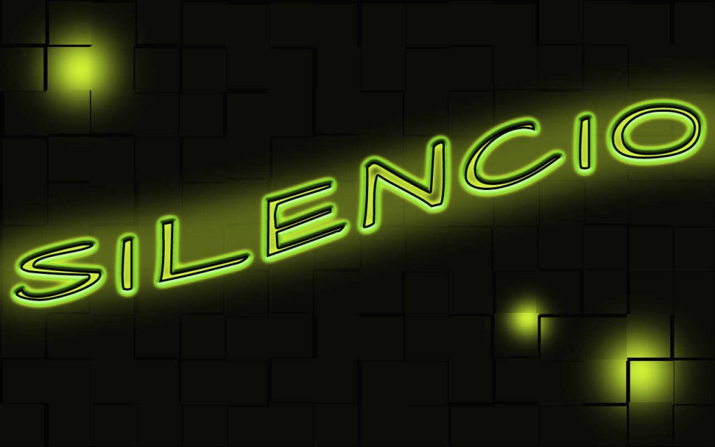 Letras en verde neón que dicen silencio